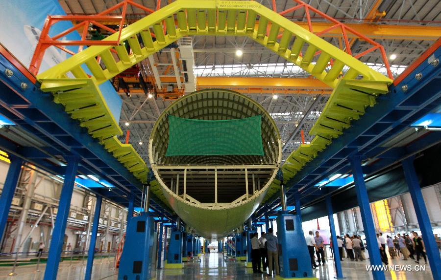 China's 1st C919 airliner starts structural assembly in Shanghai