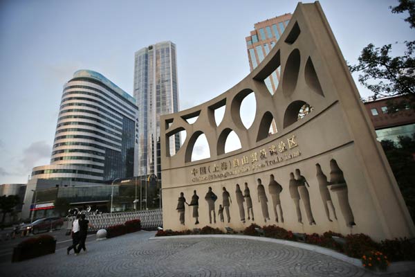 China opens businesses to foreign firms in Shanghai FTZ