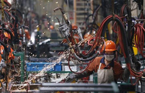 Chinese economy takes 12.3% of world total in 2013