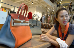 Luxury goods firms feel pinch of austerity push