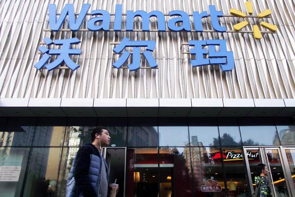 Wal-Mart cuts another 250 jobs, shuts office