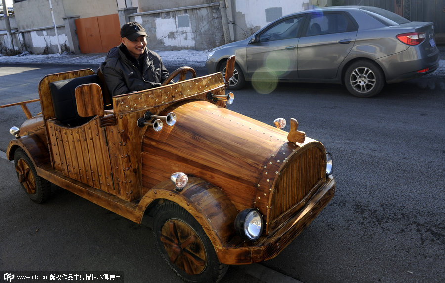 Carpenter creates e-vehicle with wood in Shenyang