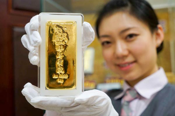 Mainland's gold imports from HK tumble 32% in 2014