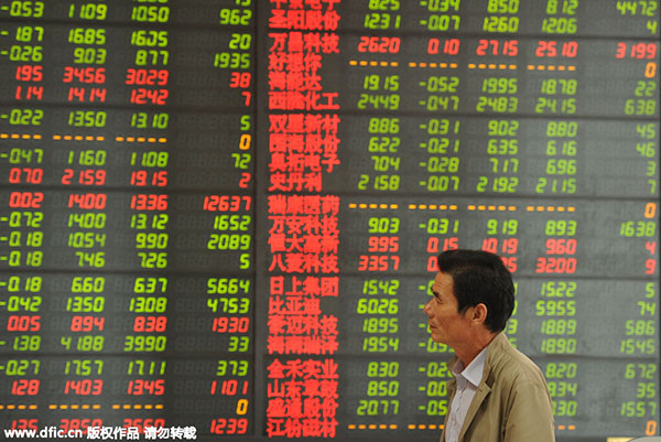 Stocks tumble, Shanghai index down 2%
