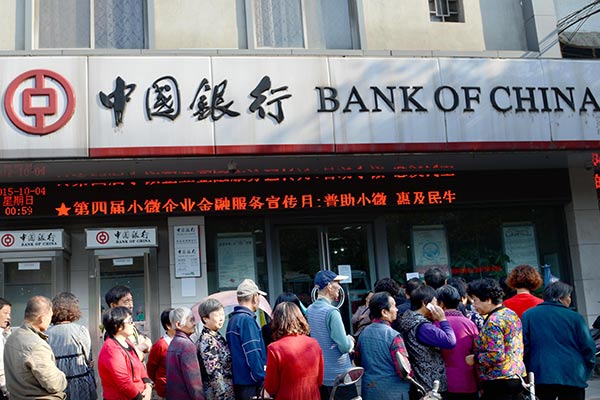 Bank of China sells stake in power company Huaneng