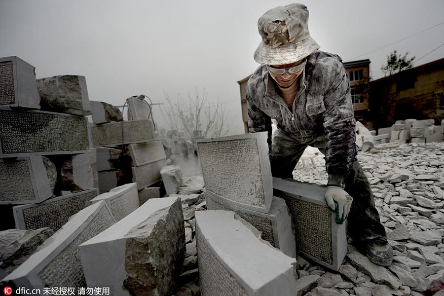 The snowy world of a tombstone carver