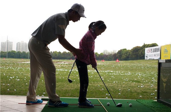Young golfers enjoy the rub of the green
