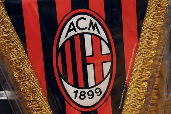 Investors sign deal to buy soccer club AC Milan