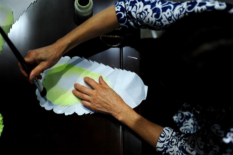 Woman creates silk Chinese cabbage