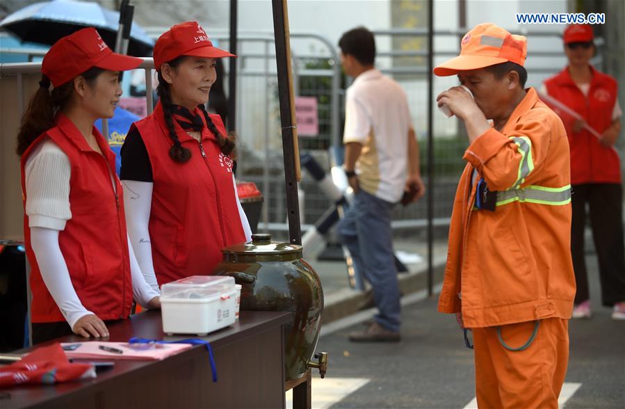 Volunteers participate in voluntary service for Hangzhou G20 Summit