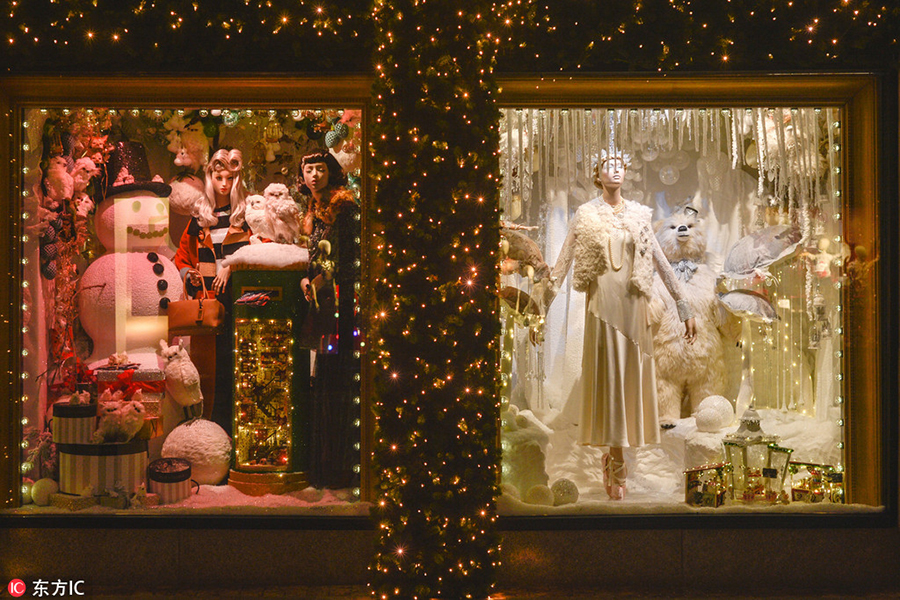 Stores decorate windows for upcoming Christmas shopping season