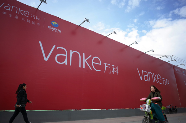 Evergrande steps up $5 billion Vanke spree