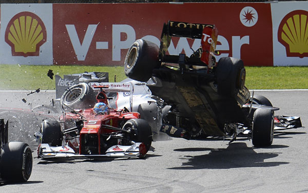 Button savours Spa win after Alonso crashes out