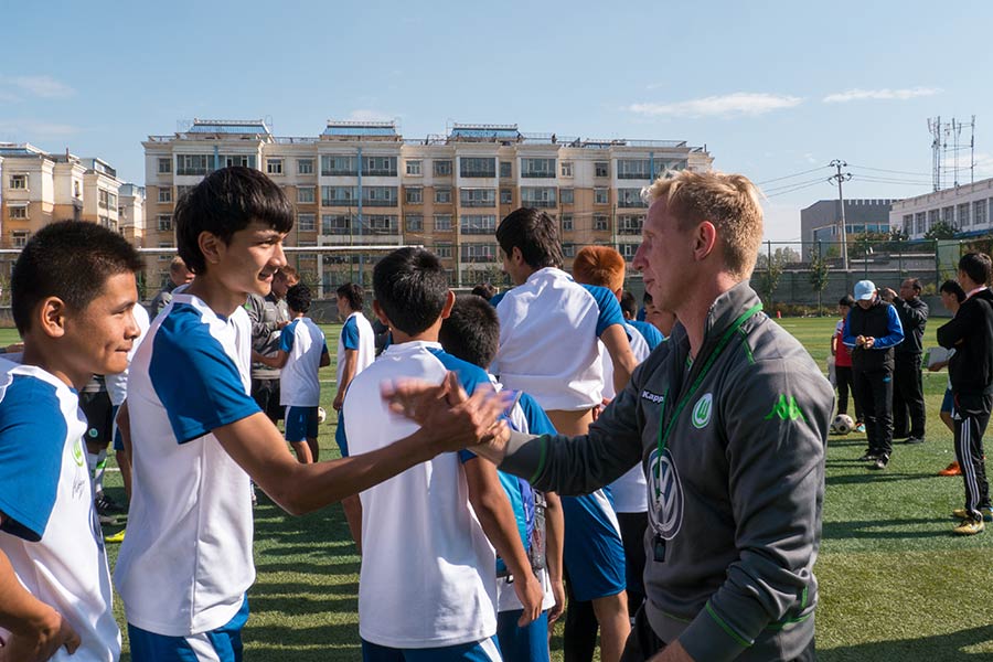 VW helps train young football stars in China