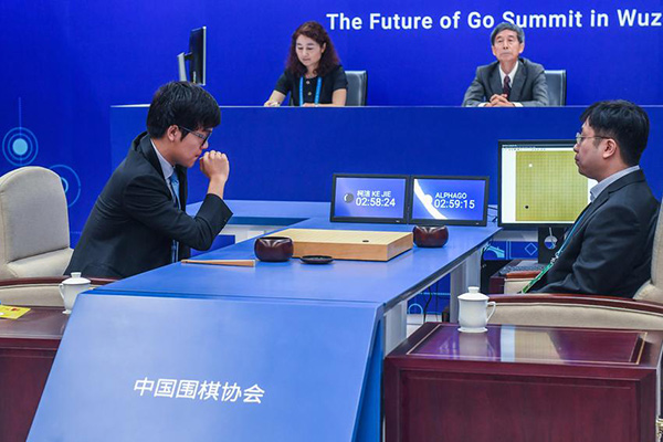 AlphaGo beats top Go player in first of three games
