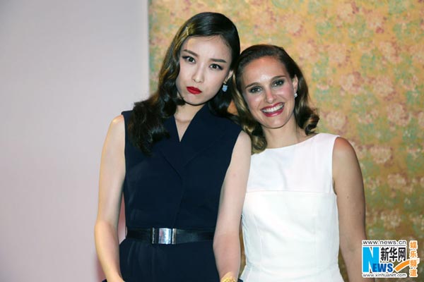 Ni Ni attends activity with Natalie Portman