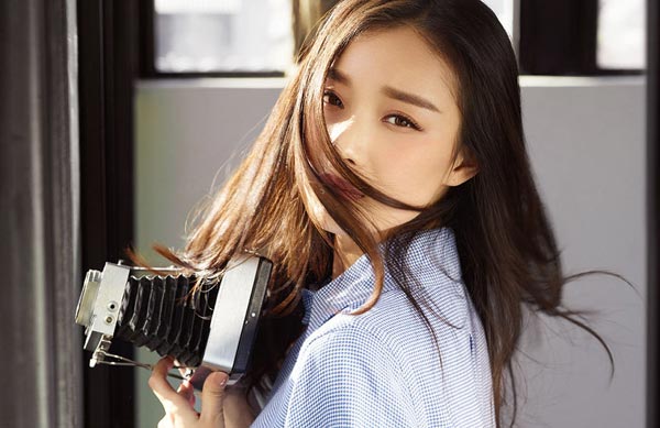 Chinese actress Ni Ni poses for fashion shoots