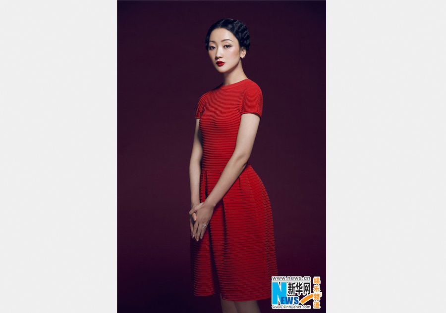 Actress Zhang Yao poses for photos