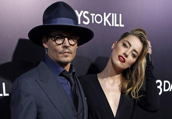 Depp's wife faces jail, fines for smuggling dogs into Australia