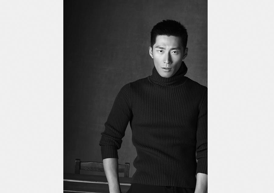 Actor Dou Xiao in black and white