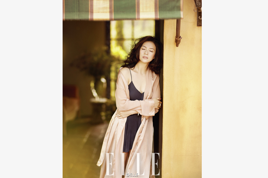 Actress Zhang Ziyi poses for fashion magazine