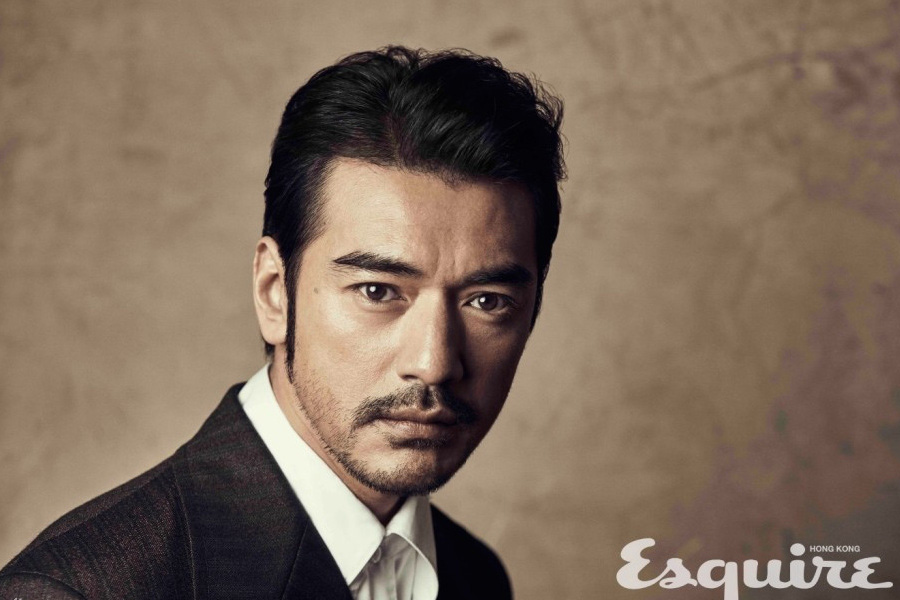 Actor Takeshi Kaneshiro poses for fashion photos