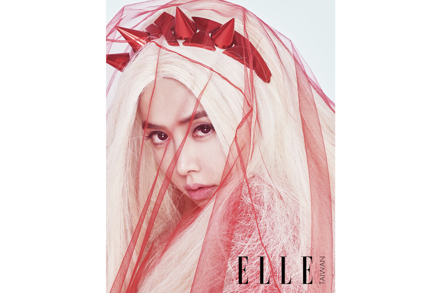 White and red: Jolin Tsai poses for fashion magazine