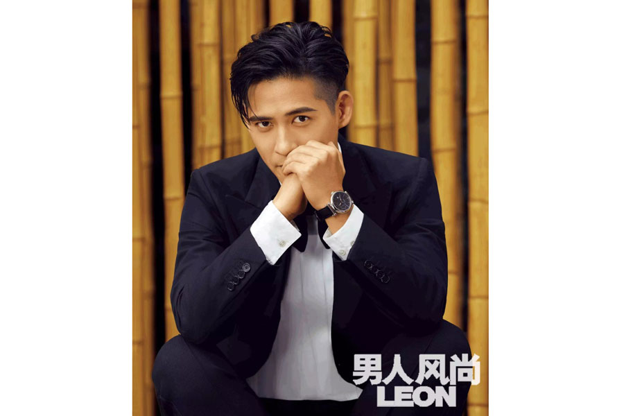 Actor Vic Chou poses for the fashion magazine