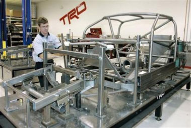 Gene Watson works on a Car of Tomorrow chassis for a Toyota Camry NASCAR Nextel Cup car at the Toyota Research and Development facility in High Point, N.C., Tuesday May 9, 2006. (AP Photo