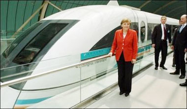 German Chancellor Angela Merkel views the worlds only operating high-speed magnetic levitation train called the Maglev in Shanghai. German officials have rejected China's demands for access to sensitive technology in exchange for building the 4.3 billion dollar high-tech rail link between Shanghai and Hangzhou, the Financial Times says(AFP