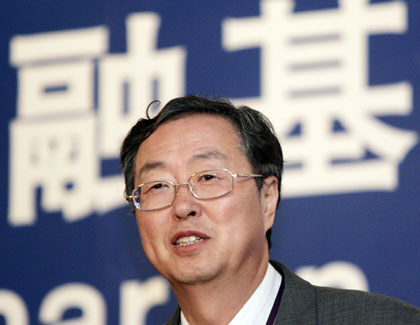 China's central bank governor Zhou Xiaochuan delivers a speech during the "Seminar on Financial Infrastructure" in Beijing June 6, 2006. China will wait to observe the impact on the economy of its late-April rise in interest rates before deciding whether to tighten credit further Zhou said on Tuesday.