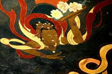 An ancient painting is seen on the roof of a hall where an ethnic Naxi Orchestra is performing in Lijiang, southwestern China's Yunnan Province July 23, 2006. The orchestra performs music that has a history of more than one thousand years, and it claims to be the oldest orchestra in the world, with 440 years of history. The Naxi people are concentrated in northwestern Yunnan and are one China's 56 ethnic groups. Picture taken July 23, 2006.