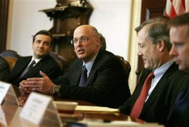 US Treasury Secretary Henry Paulson (C) participates in a roundtable discussion with a group of economists at the Treasury Department in Washington January 29, 2007. [Reuters]