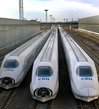 Brand new homemade high-speed trains CRH are seen at a railway station in Jinan, East China's Shandong Province, April 12, 2007. The CRH trains which could run at least 200km per hour, will serve on high speed routes between major cities after the sixth nationwide railway speedup from April 18. [Xinhua]