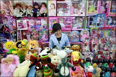 A woman selling Chinese made toys waits for customers at a shopping center in Beijing, 02 August 2007. 