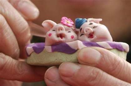 China embraces 'piglets' boom