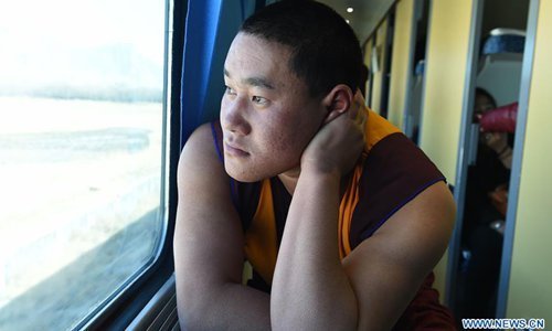 Tibetans take train home after pilgrimage or travelling