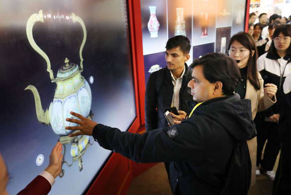 Foreign journalists visit exhibition showing China's progress