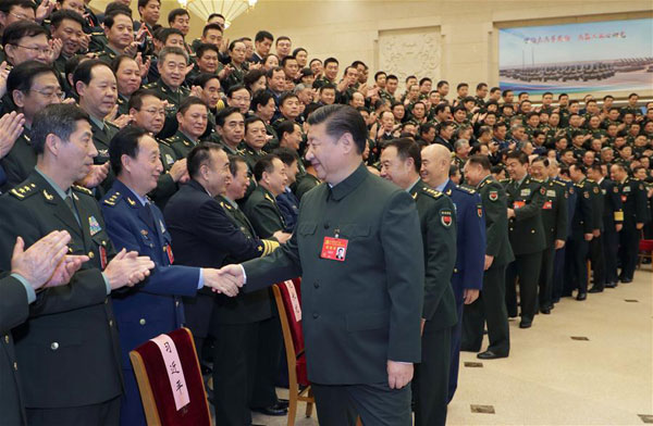 Xi calls for building a strong army