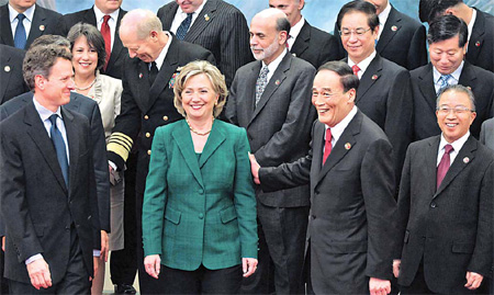 Hu pledges currency reform