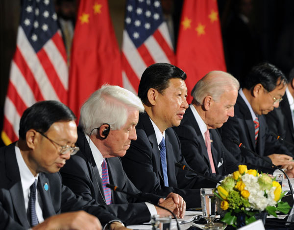 Xi to US: Ease up on economic, trade blocks