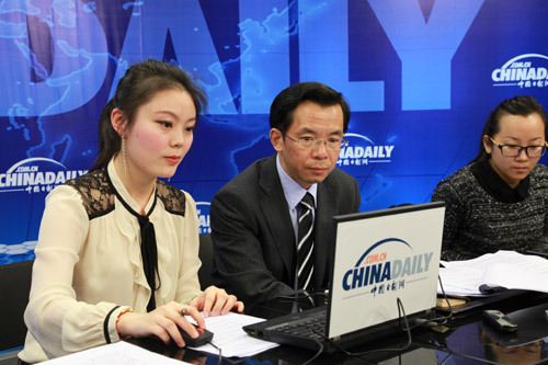 Lu talks with readers of China Daily website