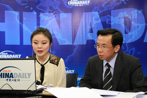 Lu talks with readers of China Daily website