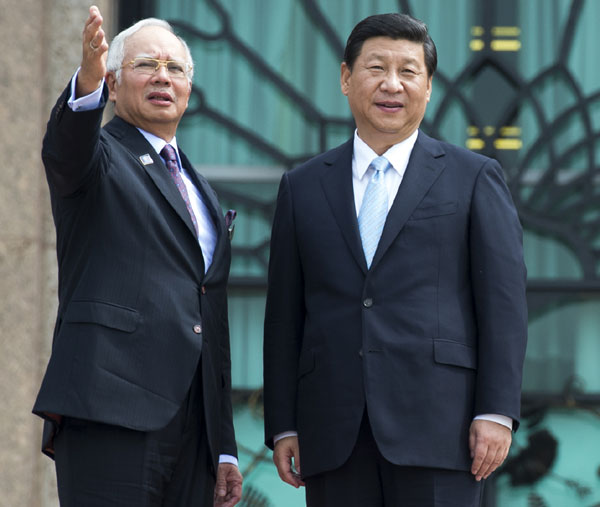 President Xi meets Malaysian PM on ties