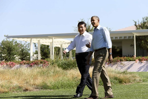 Obama and Xi start talk with a walk