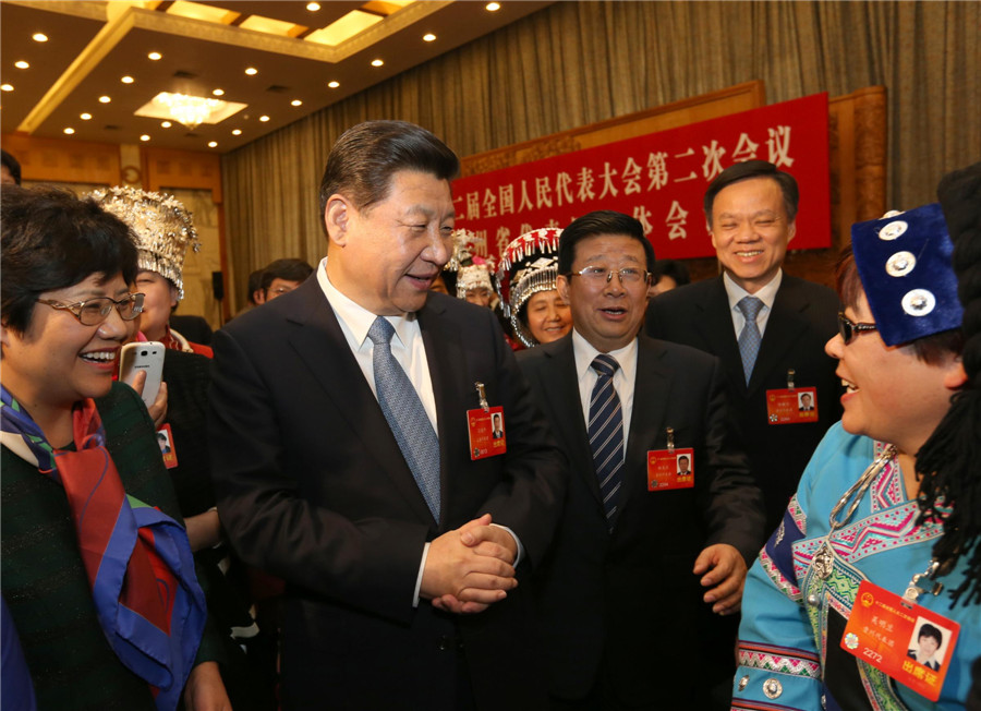 Xi urges benefits for China's poverty-stricken areas