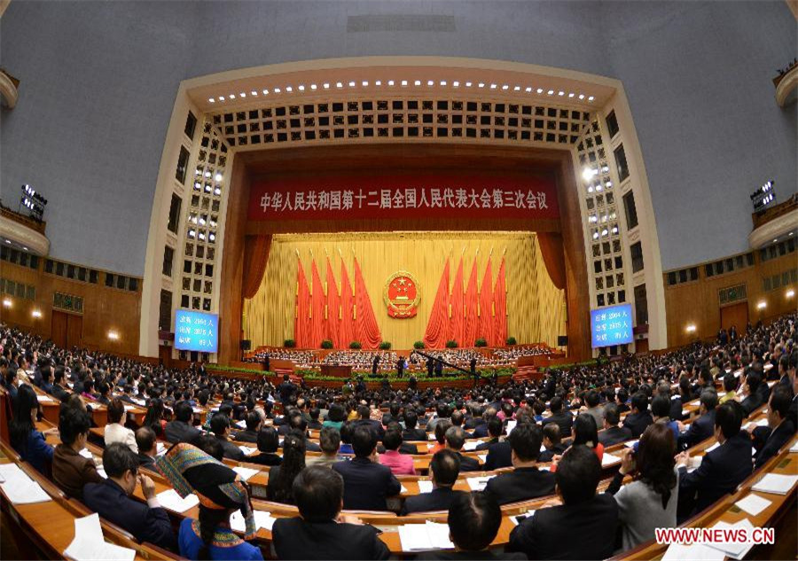 China's top legislator delivers work report