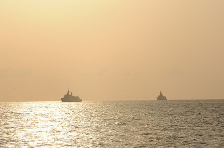 Two fleets of naval escort ships meet in Gulf of Aden