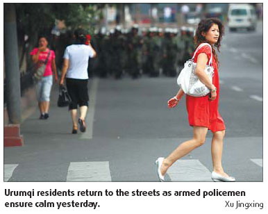 Tension remains in Urumqi after riots killed 156