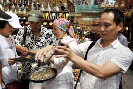 Urumqi's Int'l Bazaar reopens after deadly riot